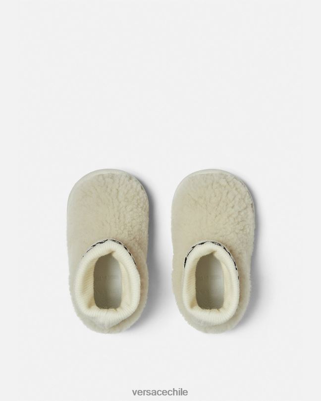 beige botas de bebé con logo de peluche Versace niños zapato V26001849